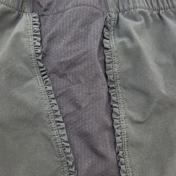 Lululemon athletica black lined running short elastic drawstring mesh Size 4 - Picture 10 of 16